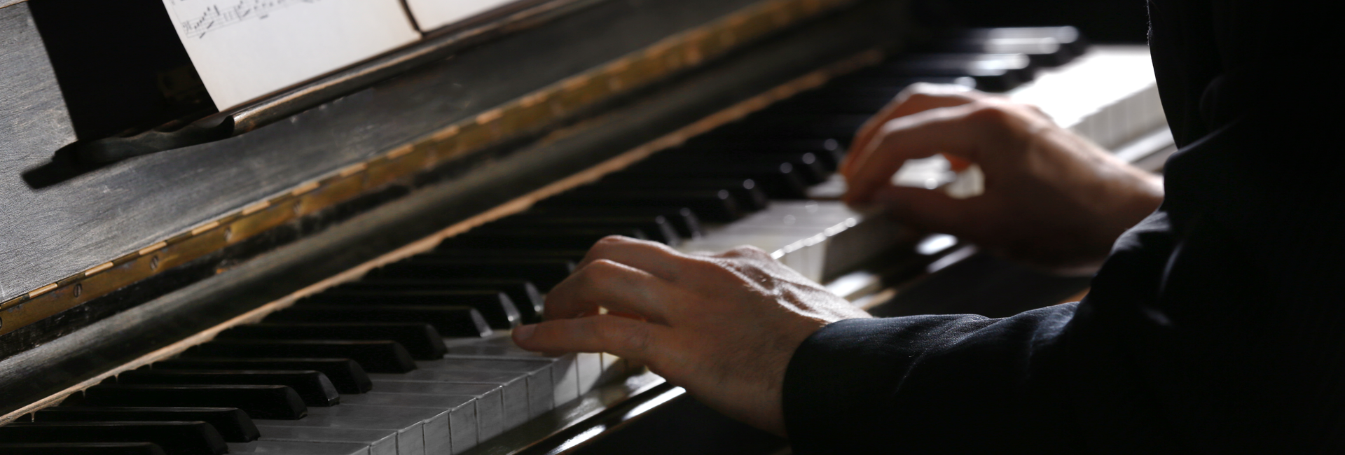 Close up of Man Hands Piano Playing